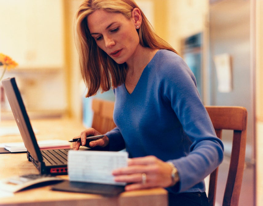 women looking at checkbook