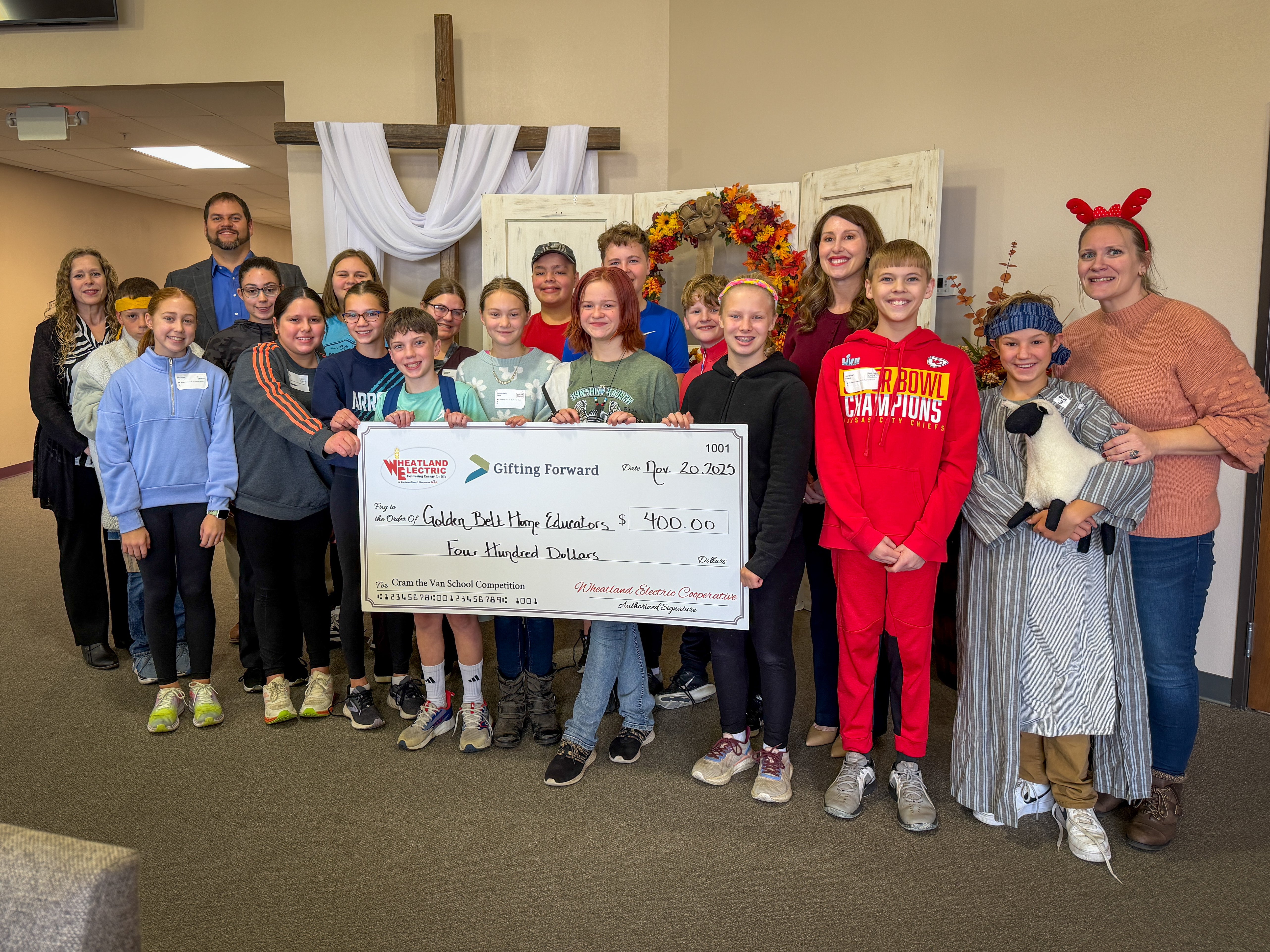 golden belt home educator group photo with check